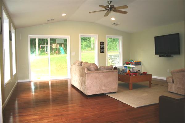 42 Indian Spring Road Ashland, MA 01721 - Photo 5 of 17 a living room with furniture and a flat screen tv