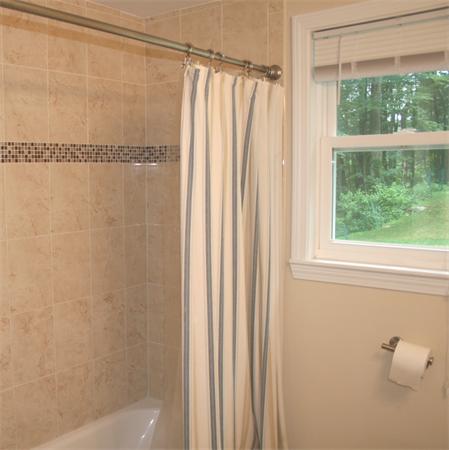 42 Indian Spring Road Ashland, MA 01721 - Photo 10 of 17 a bathroom with a shower and a window