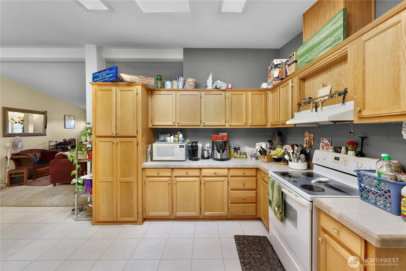 7928 Portal Way Custer, WA 98240 - Photo 19 of 39 a kitchen with a white cabinets and white appliances