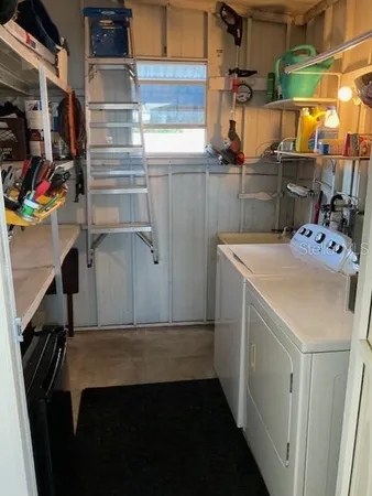 a utility room with dryer and washer