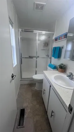 a bathroom with a sink and mirror