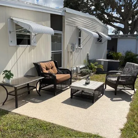 a building outdoor space with patio furniture