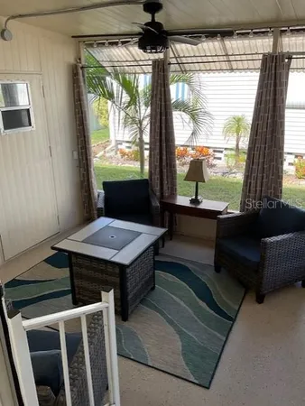 a living room with a large window