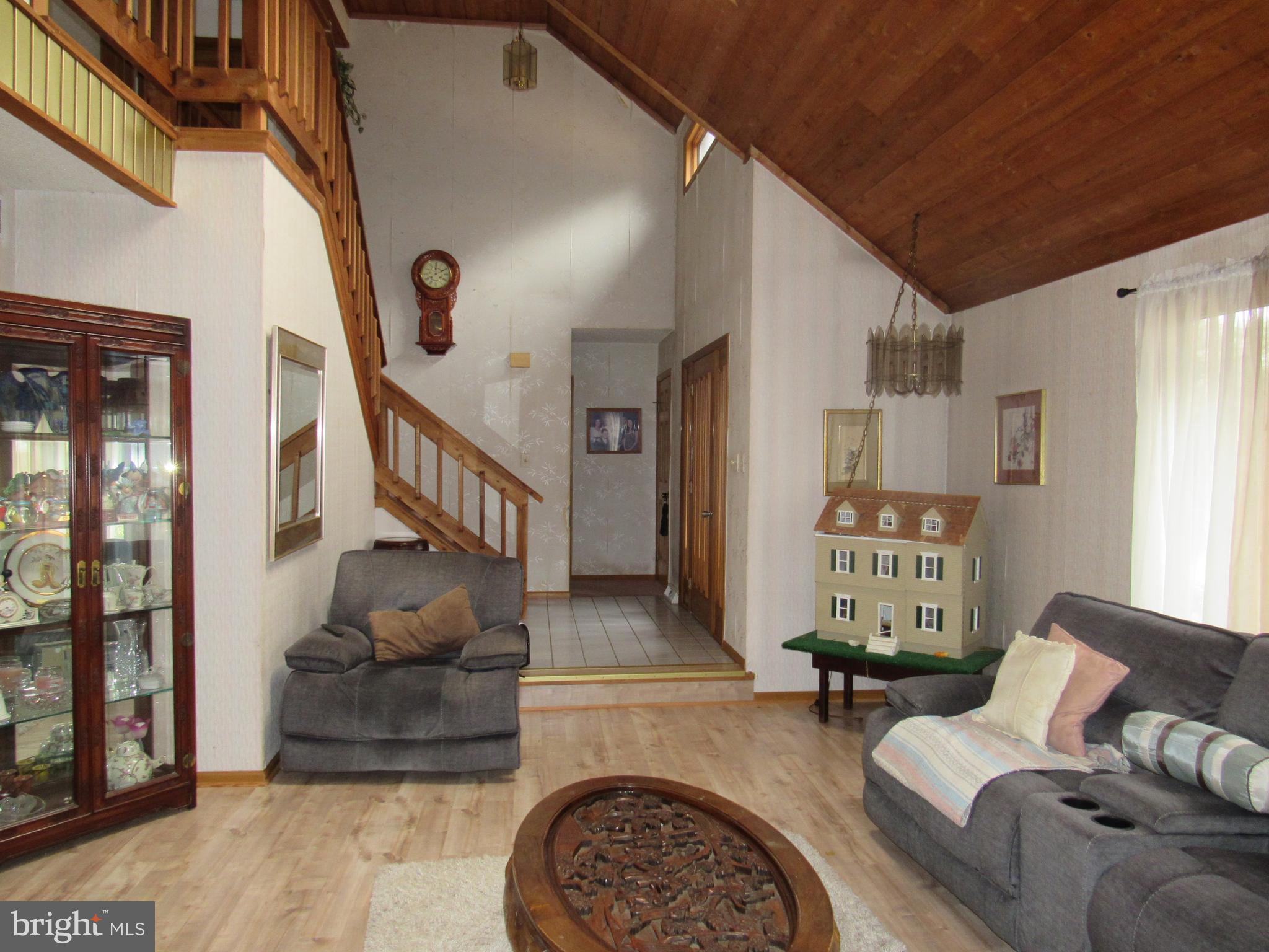 15 Cedar Grove Road Mullica Hill, NJ 08062 - Photo 12 of 41 a living room with furniture and a fireplace