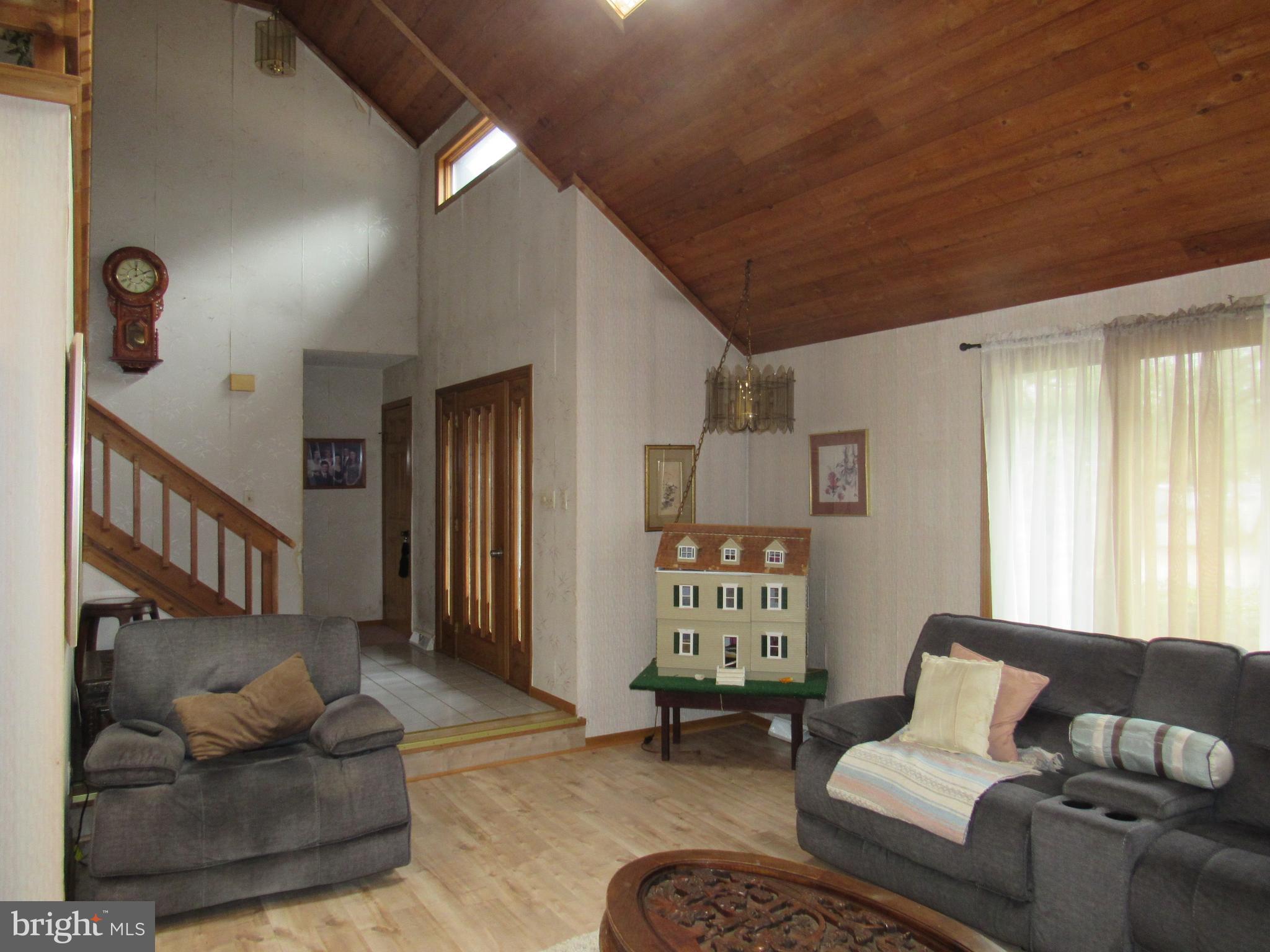 15 Cedar Grove Road Mullica Hill, NJ 08062 - Photo 15 of 41 a living room with furniture and a window
