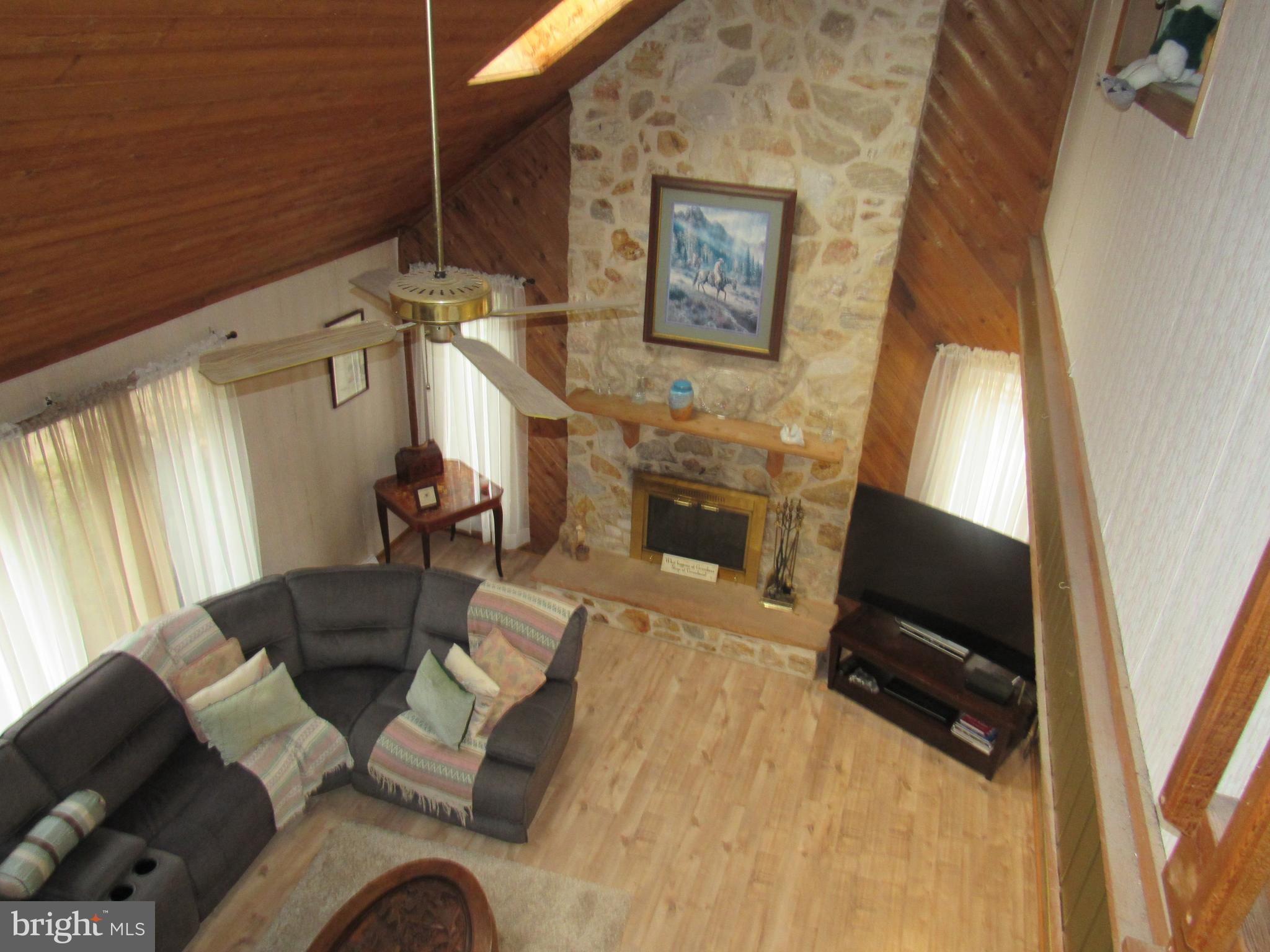 15 Cedar Grove Road Mullica Hill, NJ 08062 - Photo 17 of 41 a living room with furniture and a flat screen tv