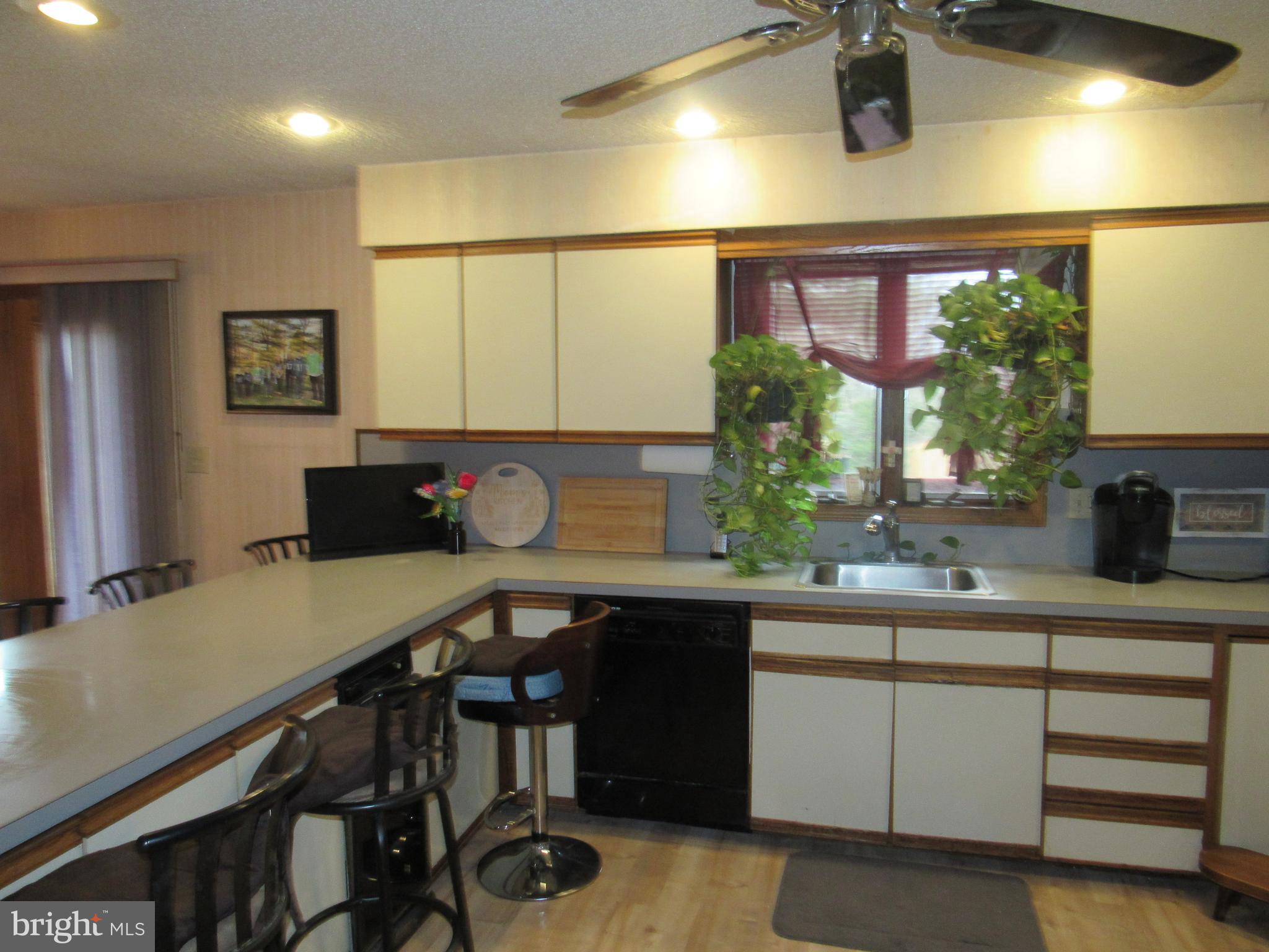 15 Cedar Grove Road Mullica Hill, NJ 08062 - Photo 20 of 41 a kitchen with a sink appliances and a counter top space
