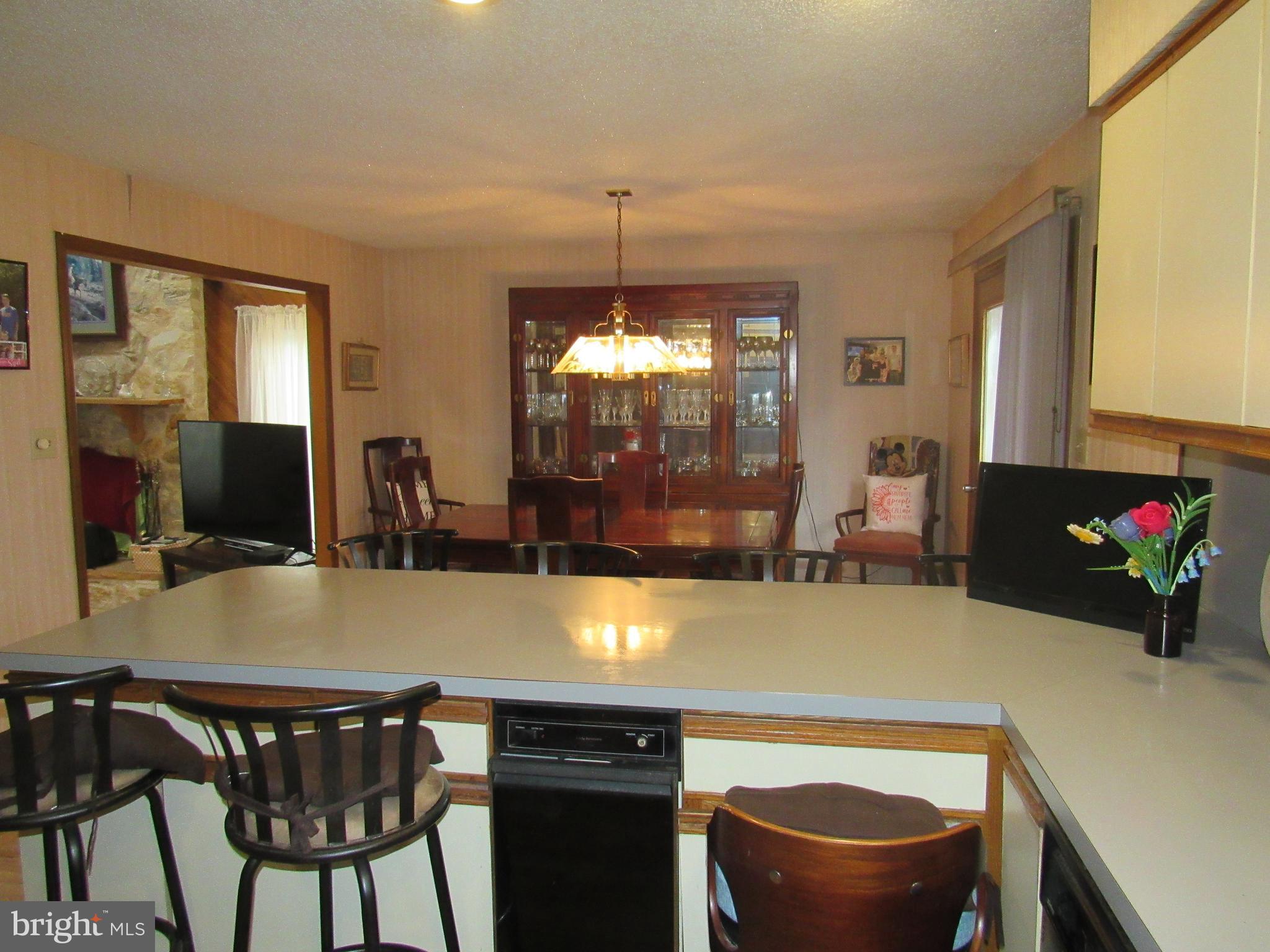 15 Cedar Grove Road Mullica Hill, NJ 08062 - Photo 24 of 41 a view of a dining room with furniture and window
