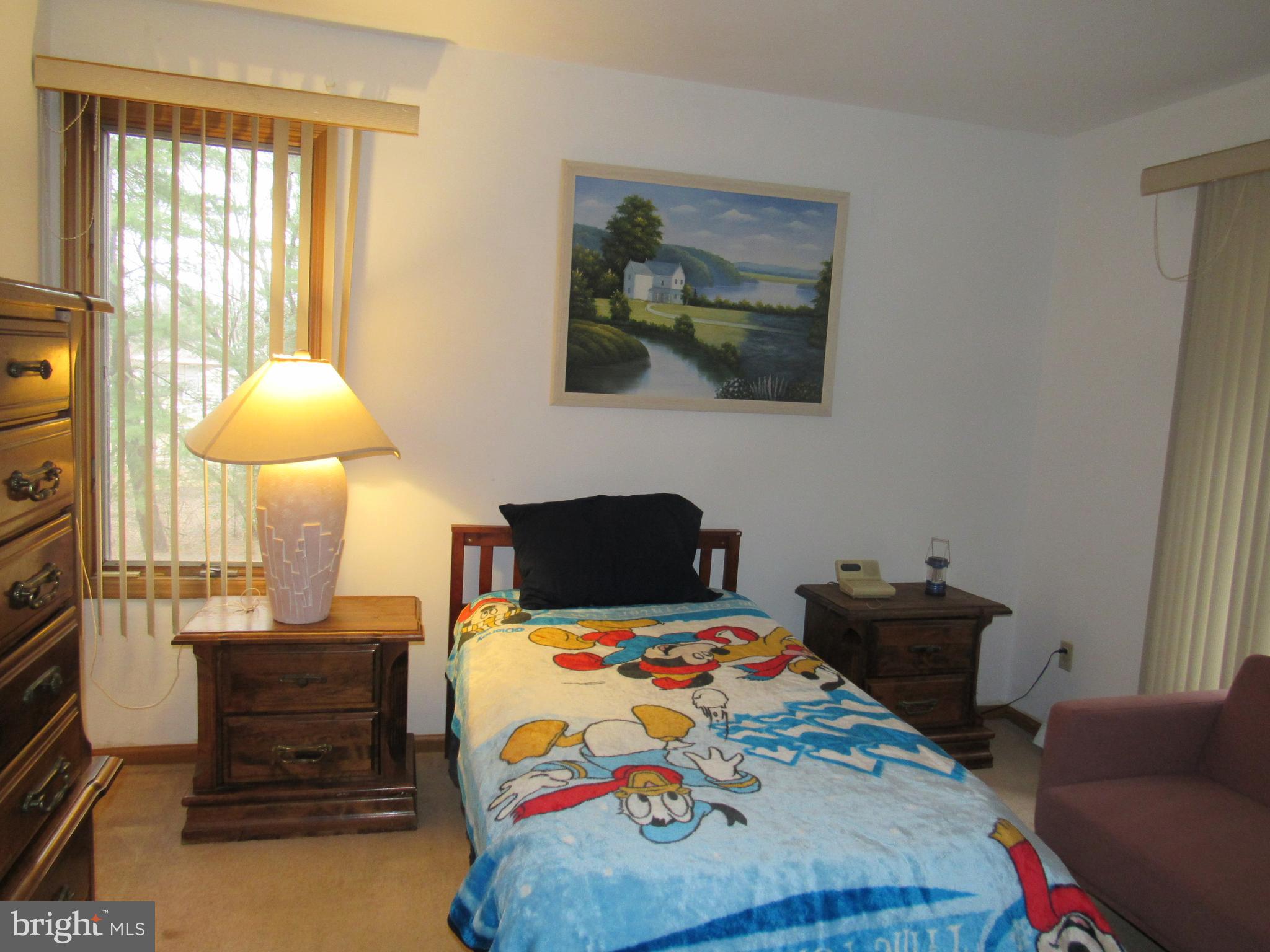 15 Cedar Grove Road Mullica Hill, NJ 08062 - Photo 27 of 41 a bedroom with a bed and wooden floor