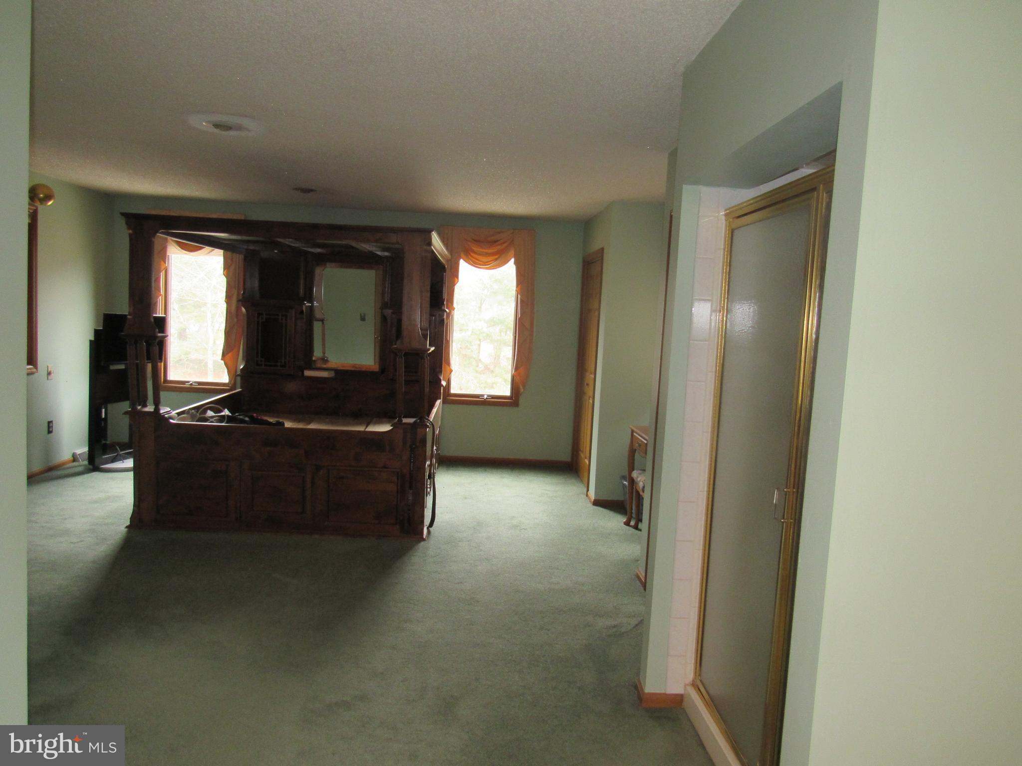 15 Cedar Grove Road Mullica Hill, NJ 08062 - Photo 29 of 41 a living room with furniture and a large window