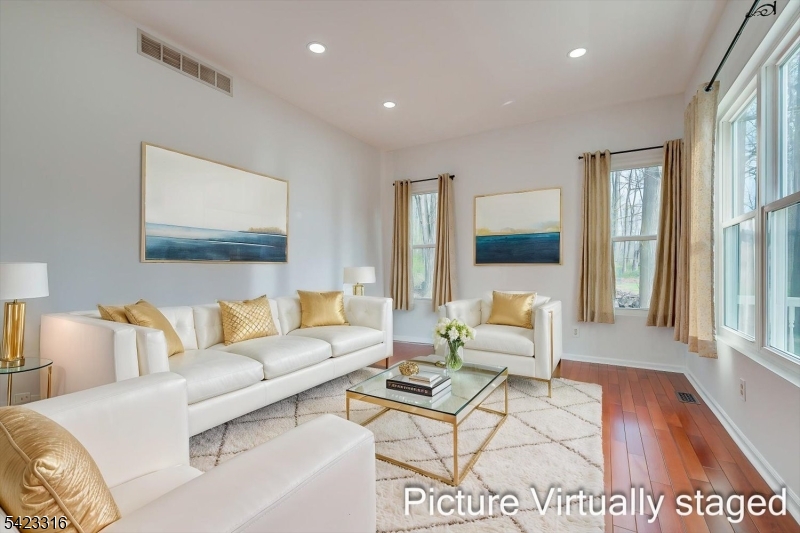 9 Stirrup Way Princeton, NJ 08540 - Photo 12 of 50 a living room with furniture and a rug