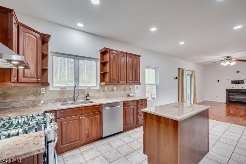 9 Stirrup Way Princeton, NJ 08540 - Photo 18 of 50 a kitchen with a sink stove and cabinets
