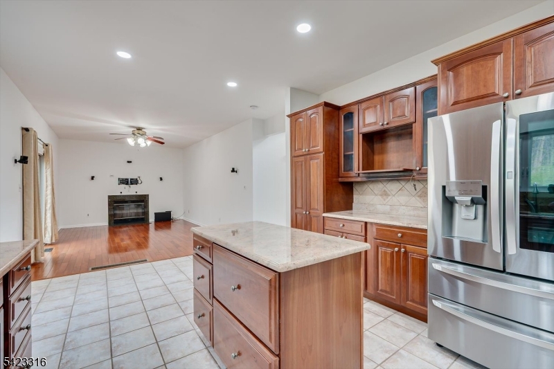 9 Stirrup Way Princeton, NJ 08540 - Photo 19 of 50 a kitchen with stainless steel appliances granite countertop a refrigerator and a sink