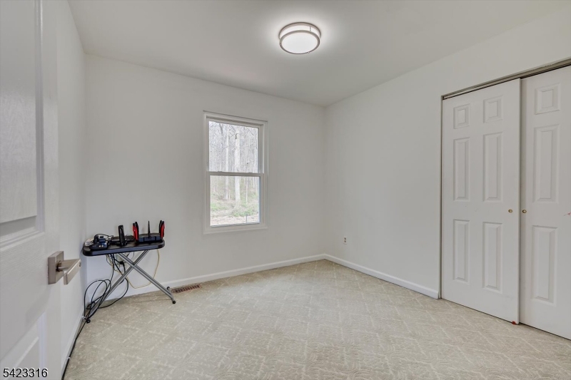 9 Stirrup Way Princeton, NJ 08540 - Photo 37 of 50 an empty room with windows