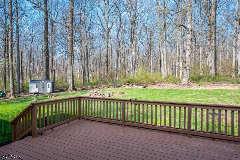 9 Stirrup Way Princeton, NJ 08540 - Photo 43 of 50 a view of deck with wooden floor and fence