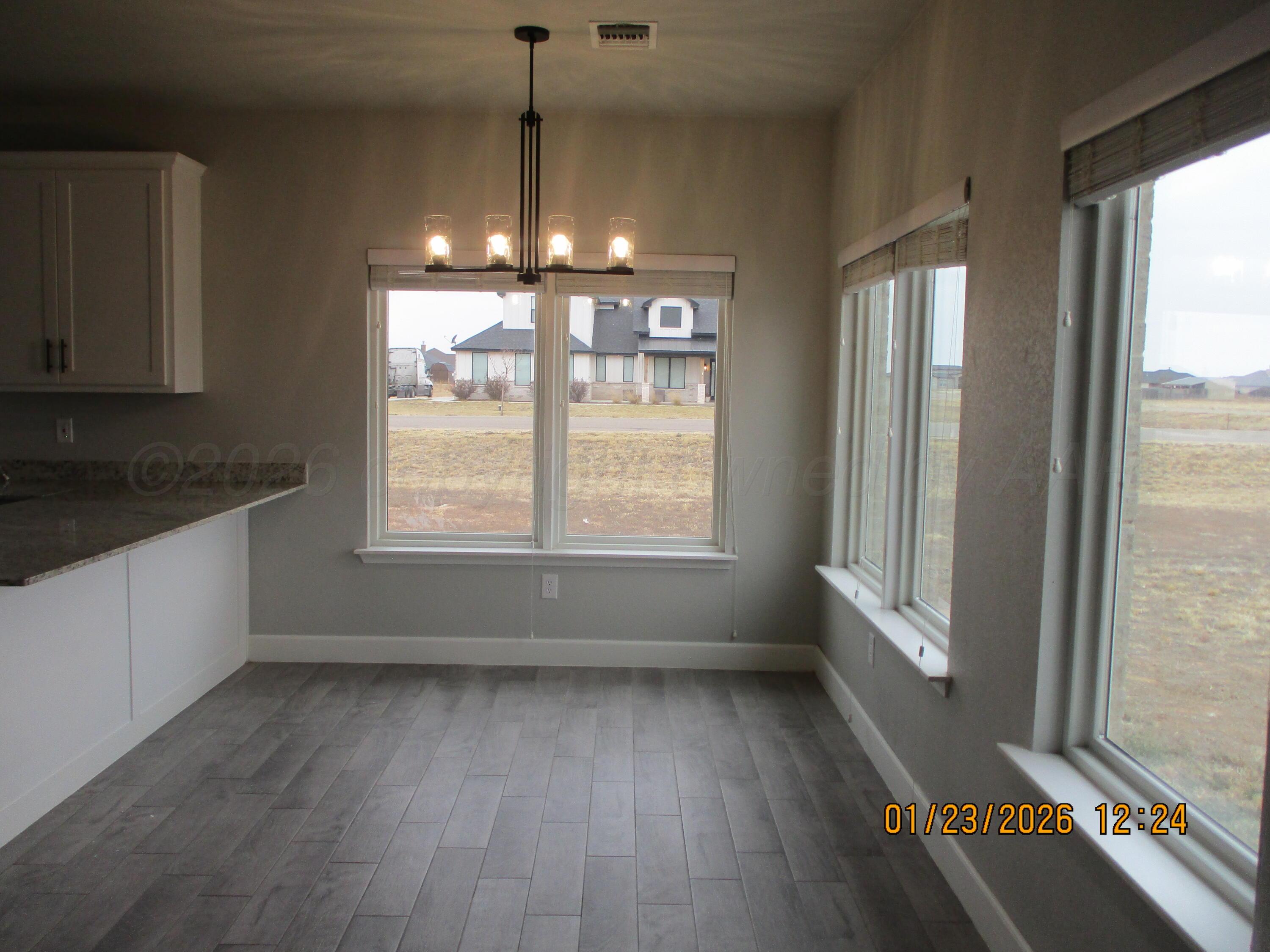8707 Clinton Glenn Road, Unit 6 Amarillo, TX 79119 - Photo 3 of 12 Dining Area