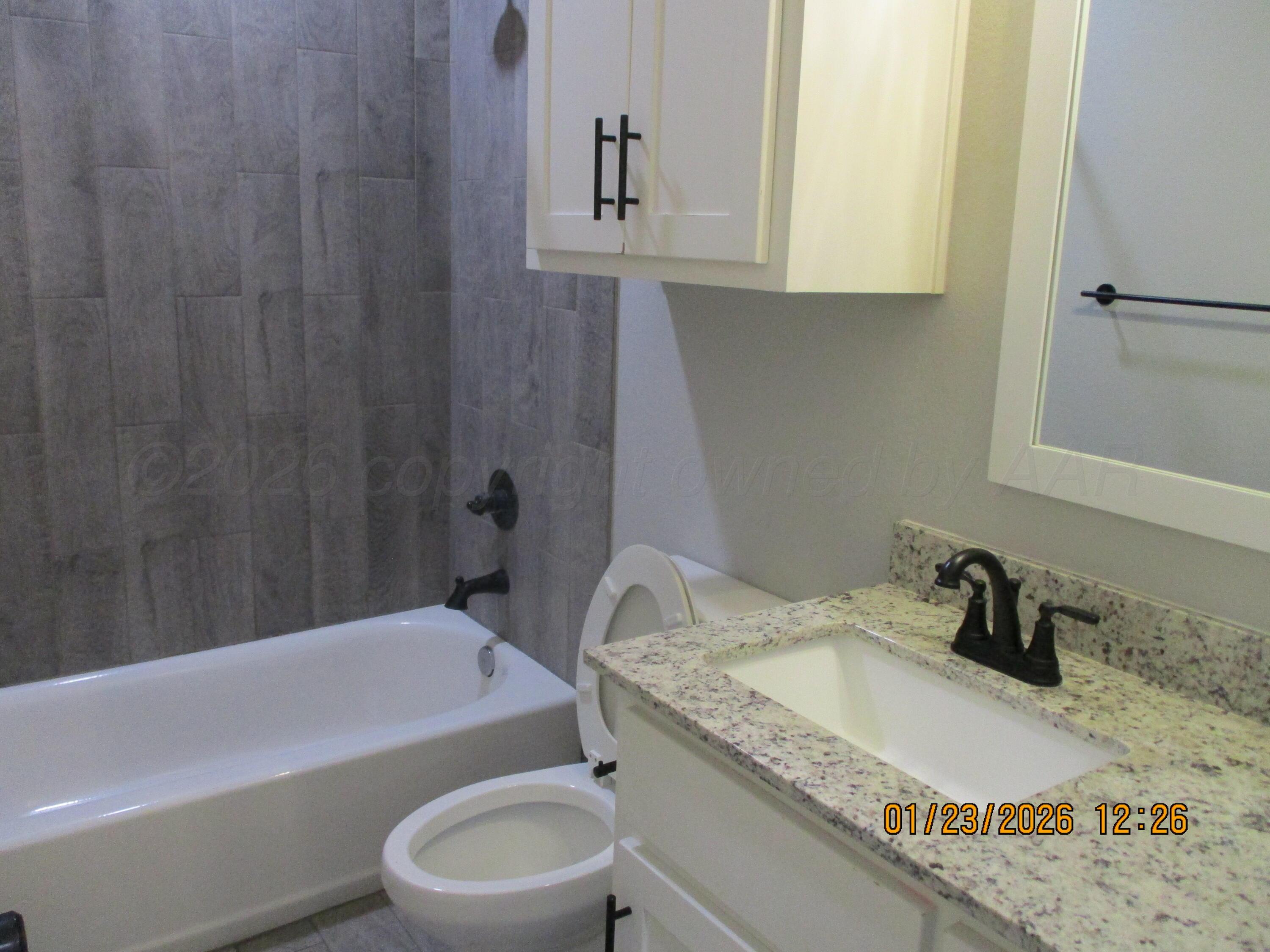 8707 Clinton Glenn Road, Unit 6 Amarillo, TX 79119 - Photo 7 of 12 Bathroom