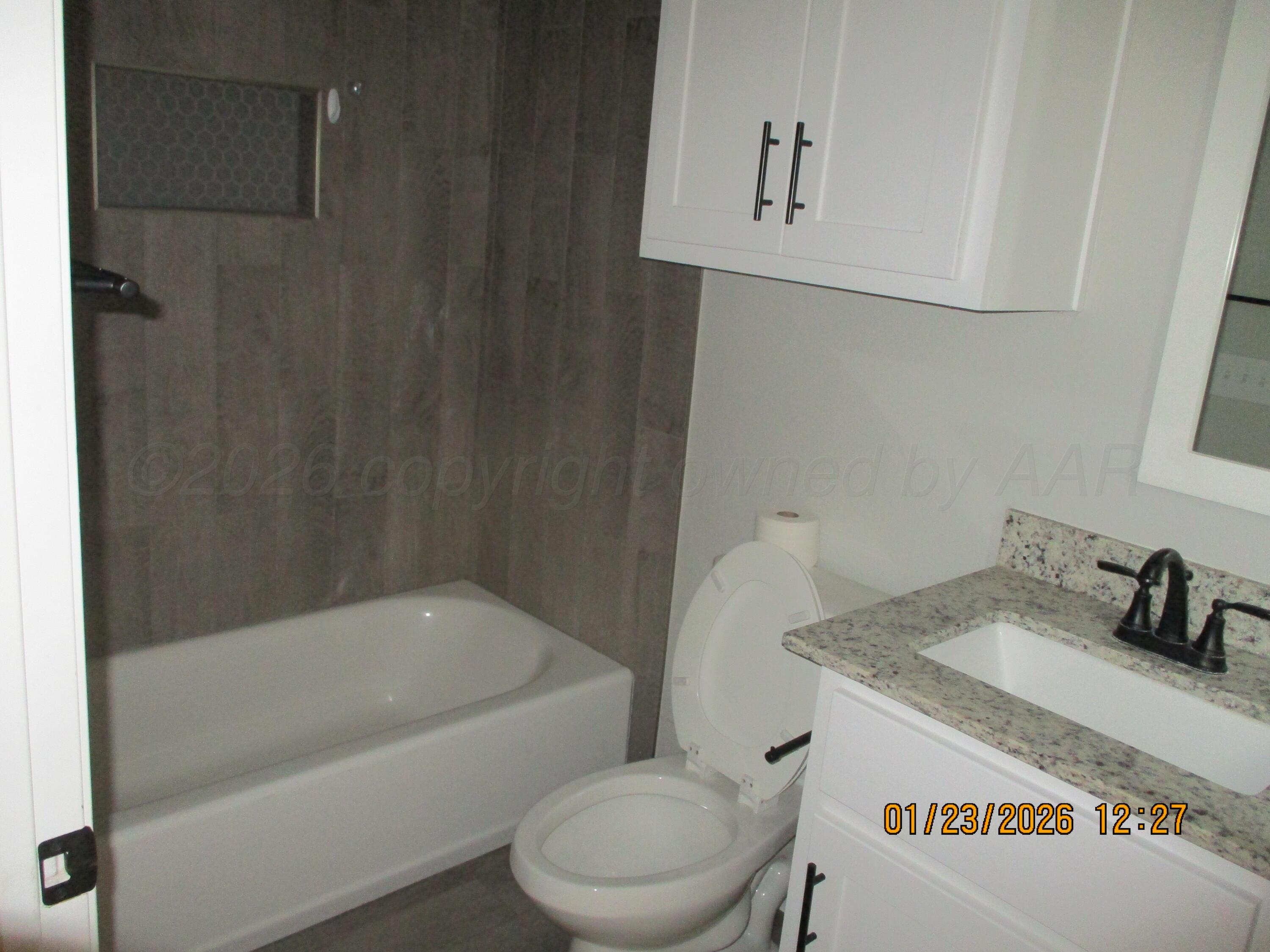 8707 Clinton Glenn Road, Unit 6 Amarillo, TX 79119 - Photo 9 of 12 Master Bathroom