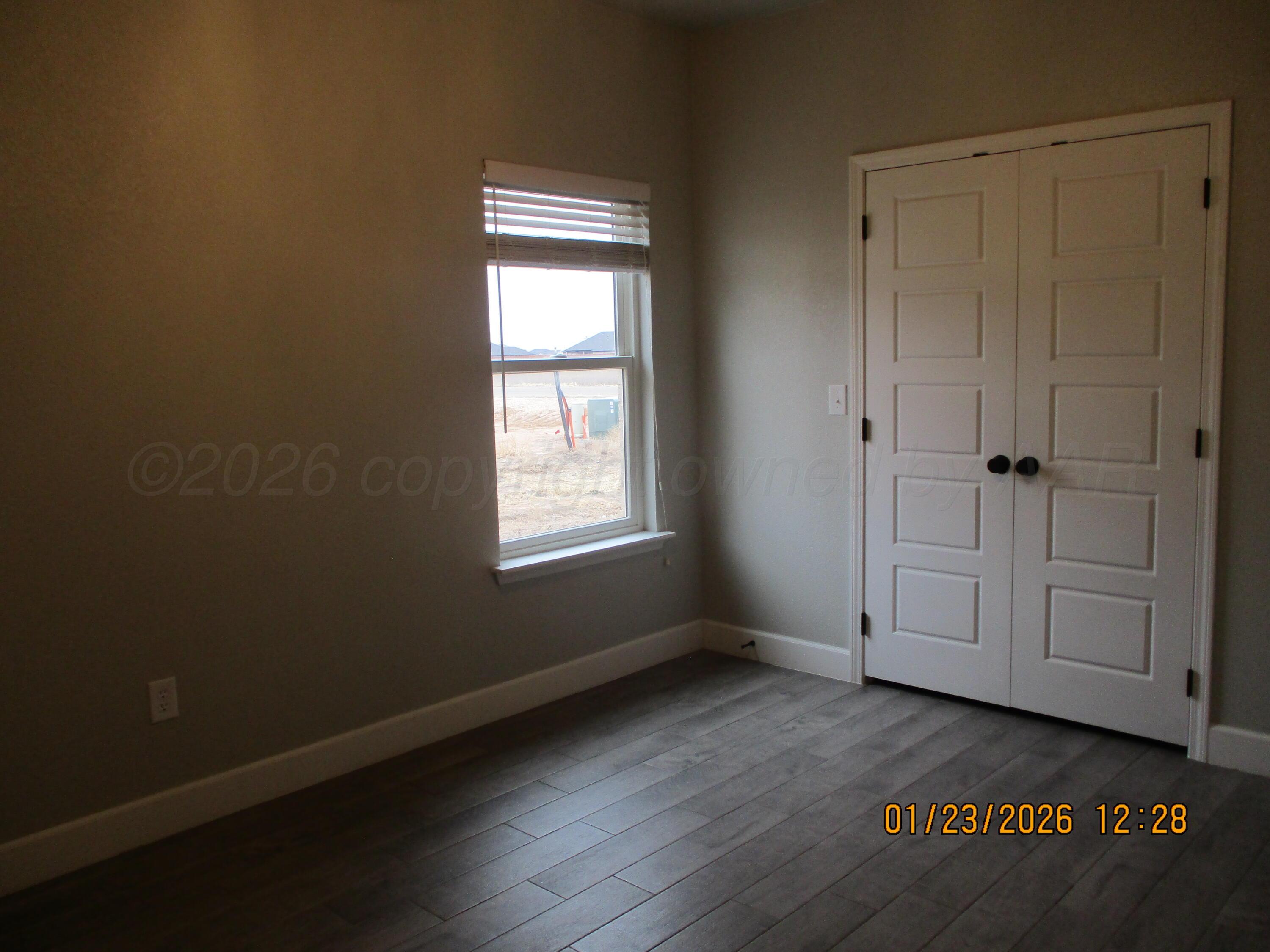 8707 Clinton Glenn Road, Unit 6 Amarillo, TX 79119 - Photo 10 of 12 Bedroom 2