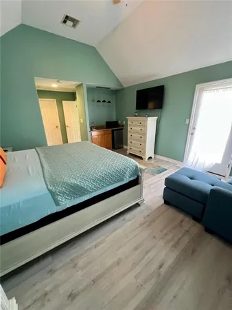 a living room with a couch and a flat screen tv