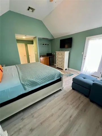 a living room with a couch and a flat screen tv