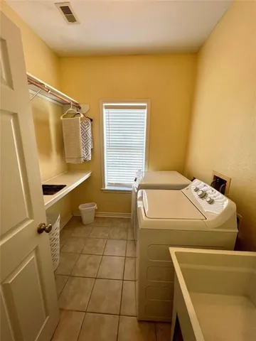 a bathroom with a sink and bathtub