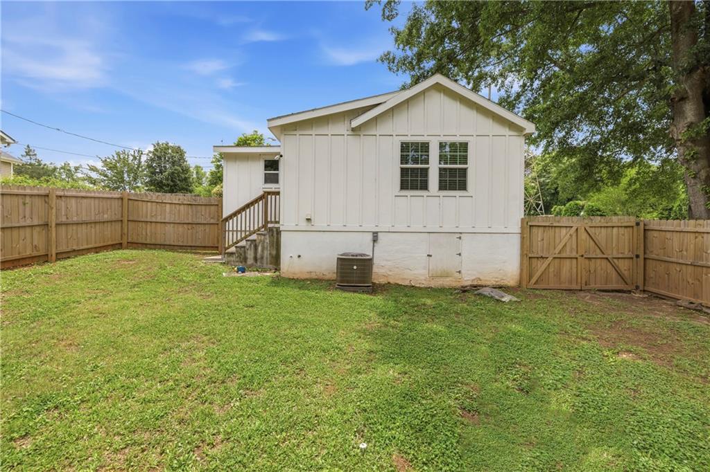 156 Pine Avenue Commerce, GA 30529 - Photo 23 of 35 a view of a backyard with a garden