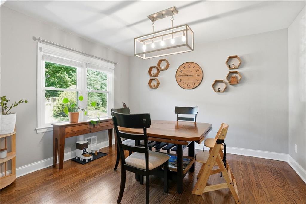 1430 Thomas Road Decatur, GA 30030 - Photo 9 of 42 a view of a dining room with a table and chairs
