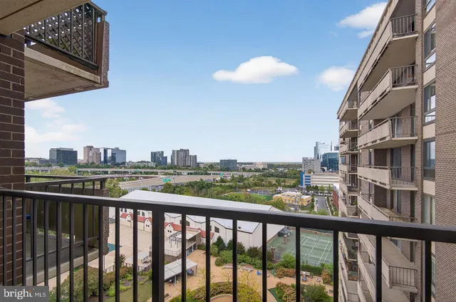 a view of city from a balcony