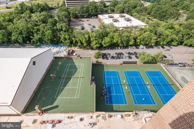 a view of swimming pool with a yard