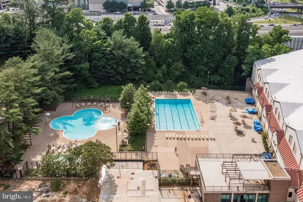 an aerial view of a house with outdoor space