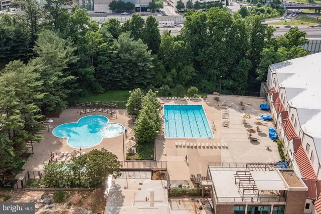 an aerial view of a house with outdoor space