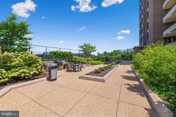 a view of a terrace with sitting area