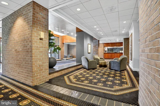 a living room with rug rug and a rug