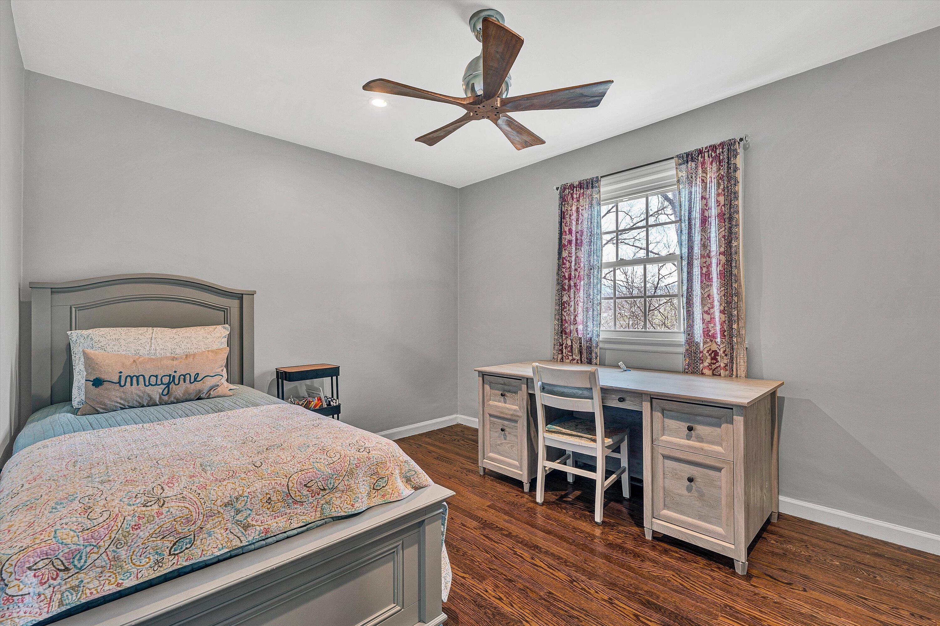 3259 Rasmont Road Roanoke, VA 24018 - Photo 19 of 36 a bedroom with a bed and a desk in it