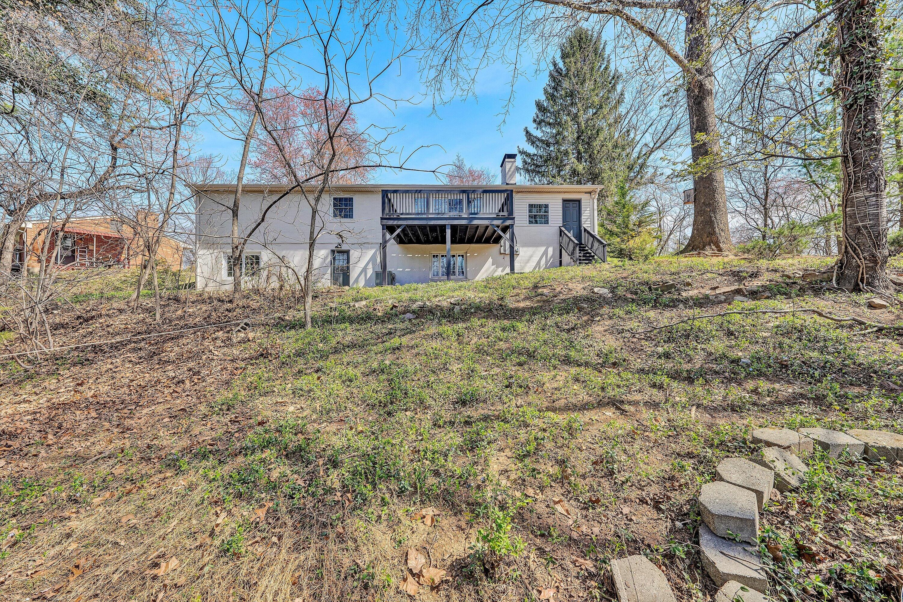 3259 Rasmont Road Roanoke, VA 24018 - Photo 34 of 36 a front view of a house with a yard