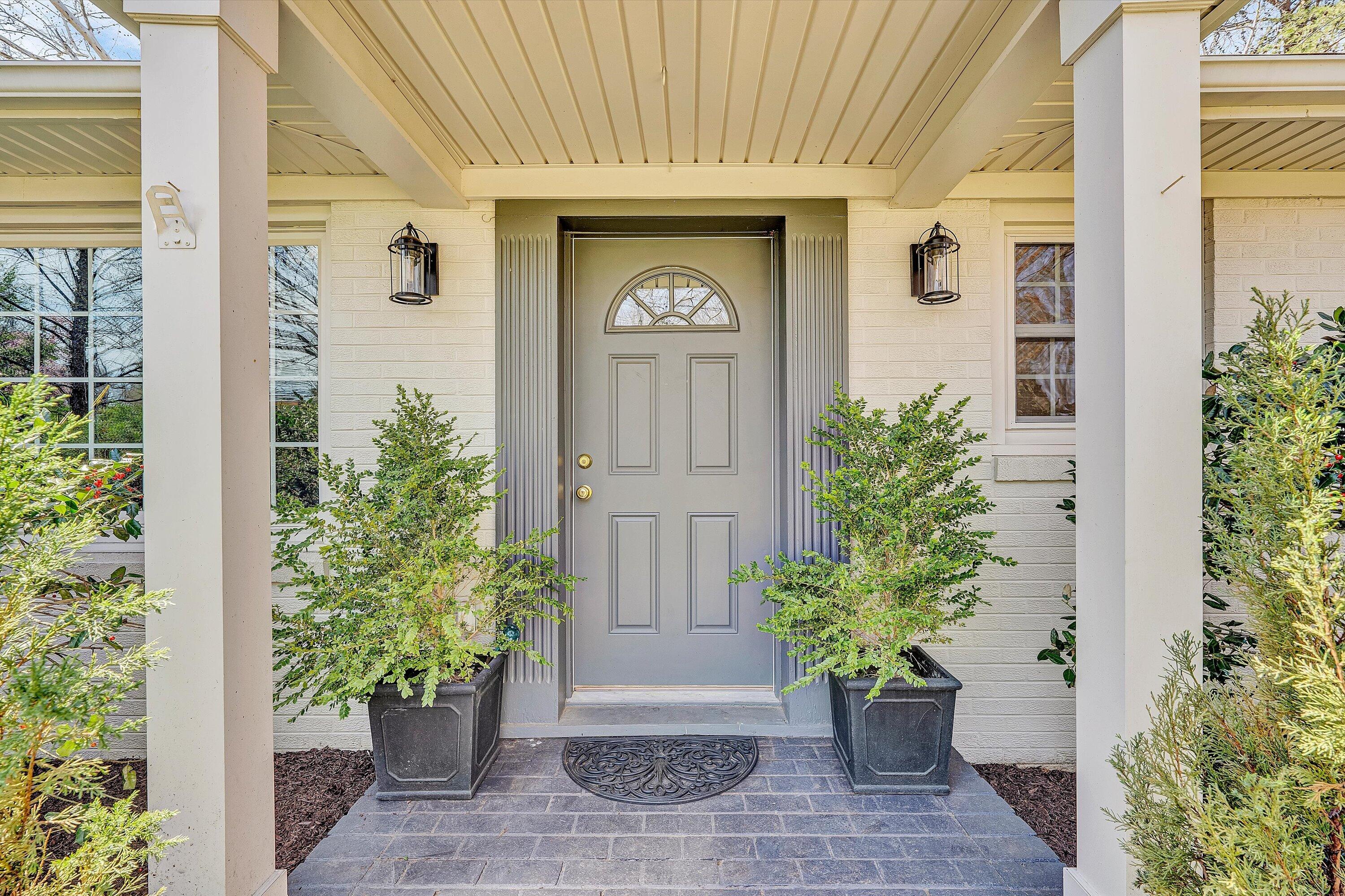 3259 Rasmont Road Roanoke, VA 24018 - Photo 4 of 36 a potted plant sitting in front of a door