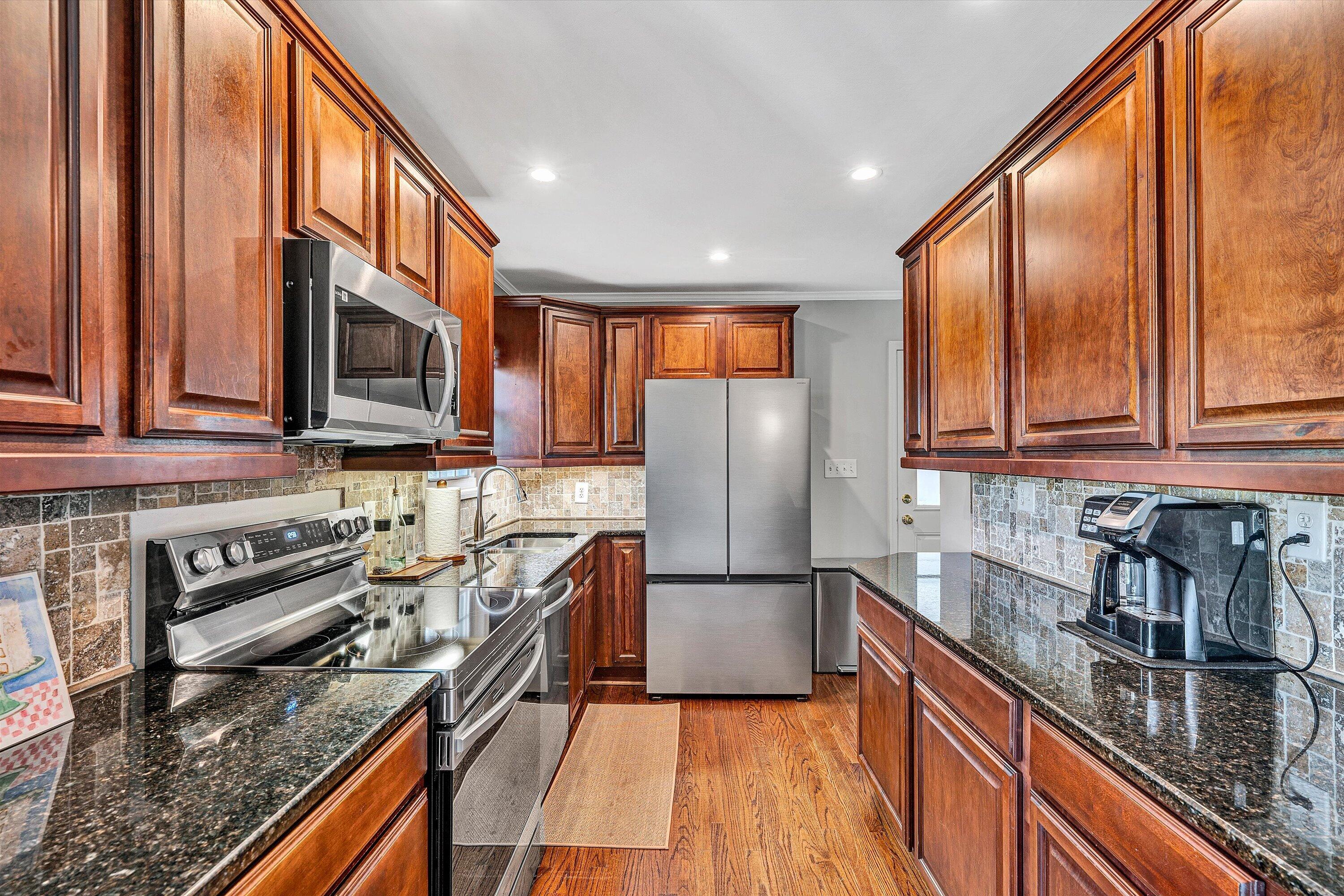 3259 Rasmont Road Roanoke, VA 24018 - Photo 8 of 36 a kitchen with stainless steel appliances granite countertop a refrigerator a stove top oven a sink and dishwasher