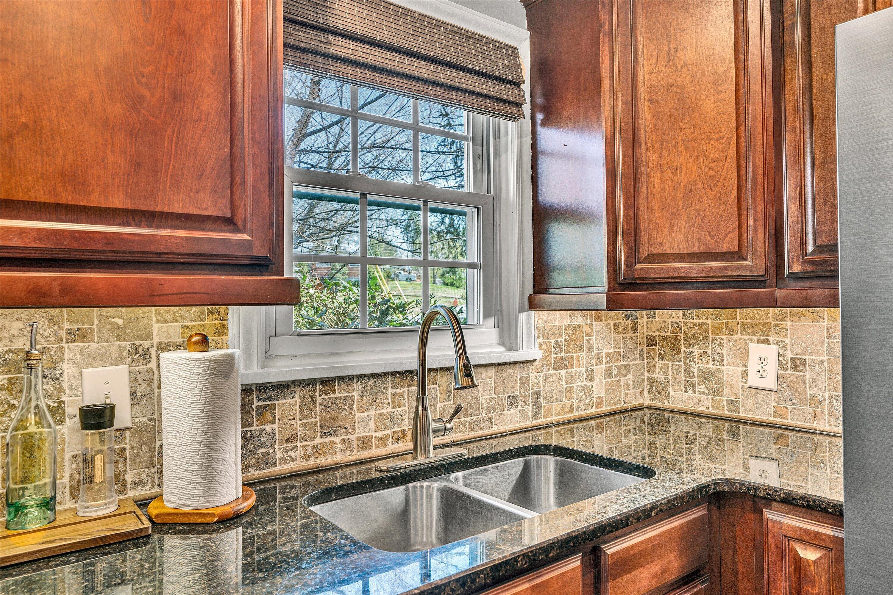 3259 Rasmont Road Roanoke, VA 24018 - Photo 9 of 36 a kitchen with a sink and large window