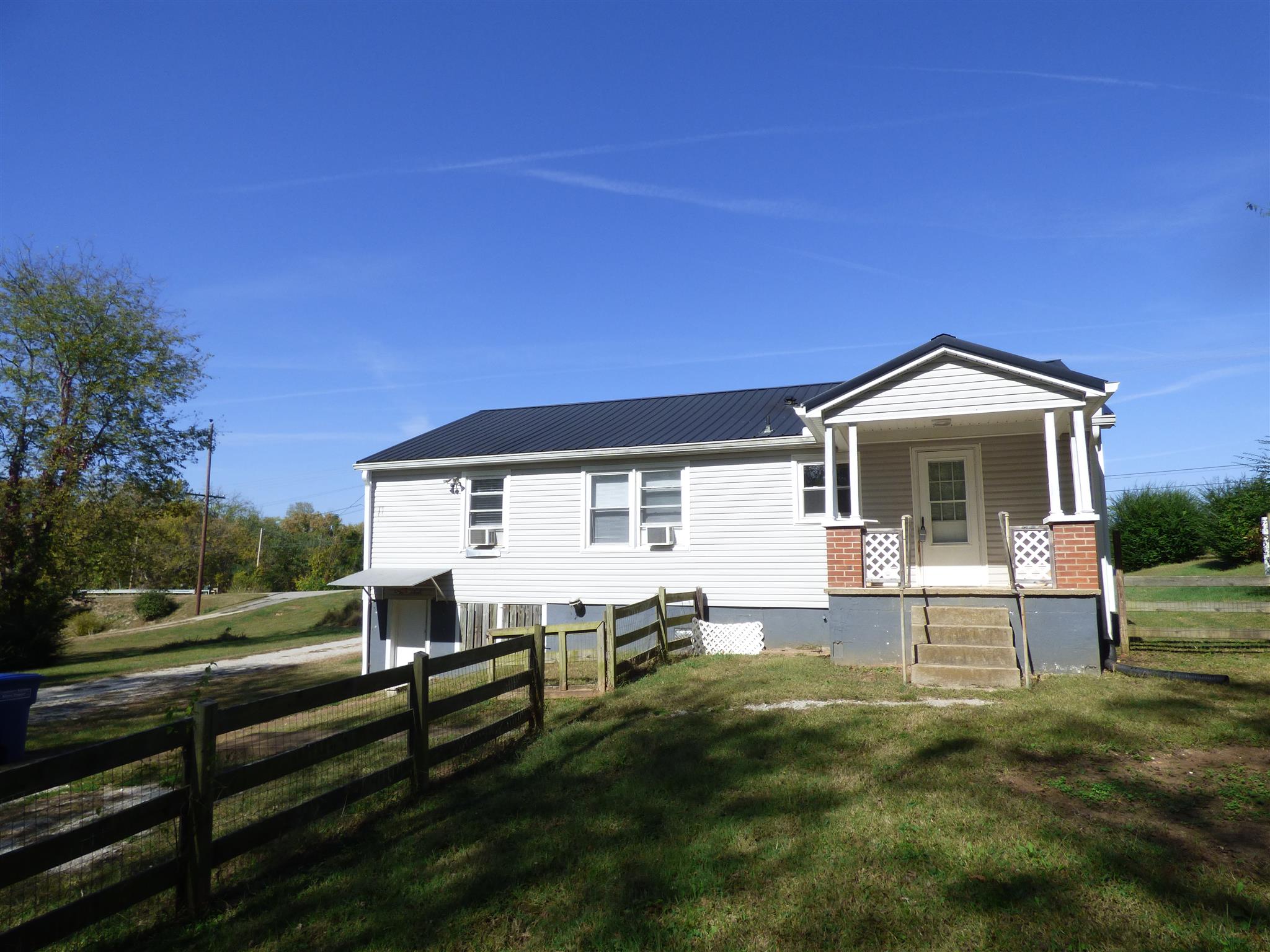 1259 1st Avenue Mount Pleasant, TN 38474 - Photo 14 of 18 a view of house and outdoor space