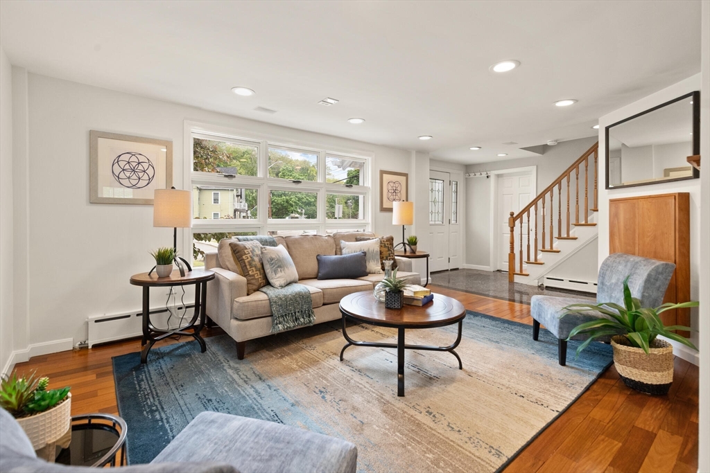151 Forest Street Malden, MA 02148 - Photo 1 of 33 a living room with furniture potted plant and window