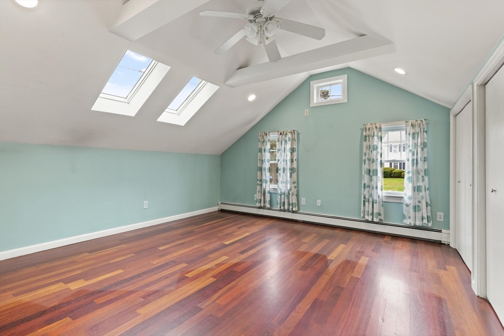 151 Forest Street Malden, MA 02148 - Photo 19 of 33 wooden floor in an empty room with a window