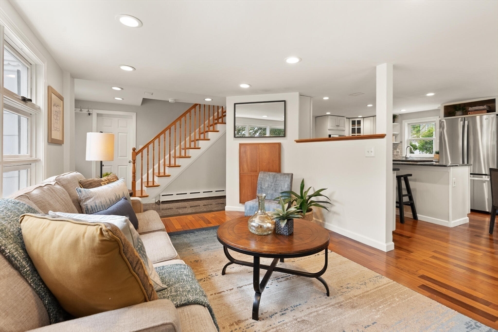 151 Forest Street Malden, MA 02148 - Photo 5 of 33 a living room with furniture and a wooden floor