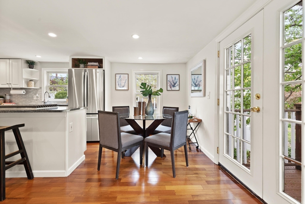 151 Forest Street Malden, MA 02148 - Photo 6 of 33 a view of a dining room with furniture and wooden floor