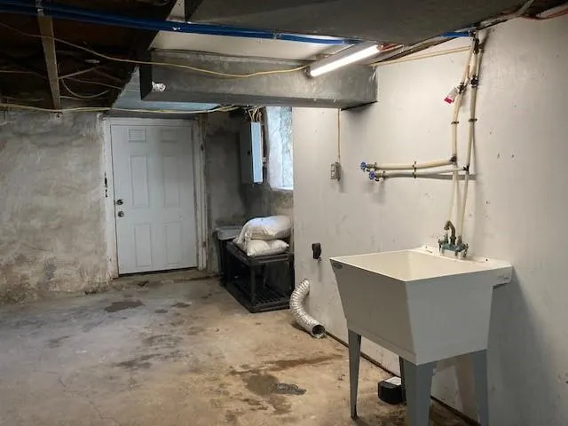 a living room with a couch and a table