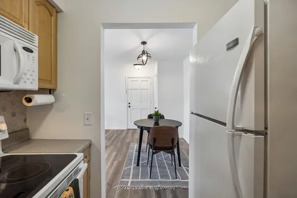 a view of a balcony with wooden floor