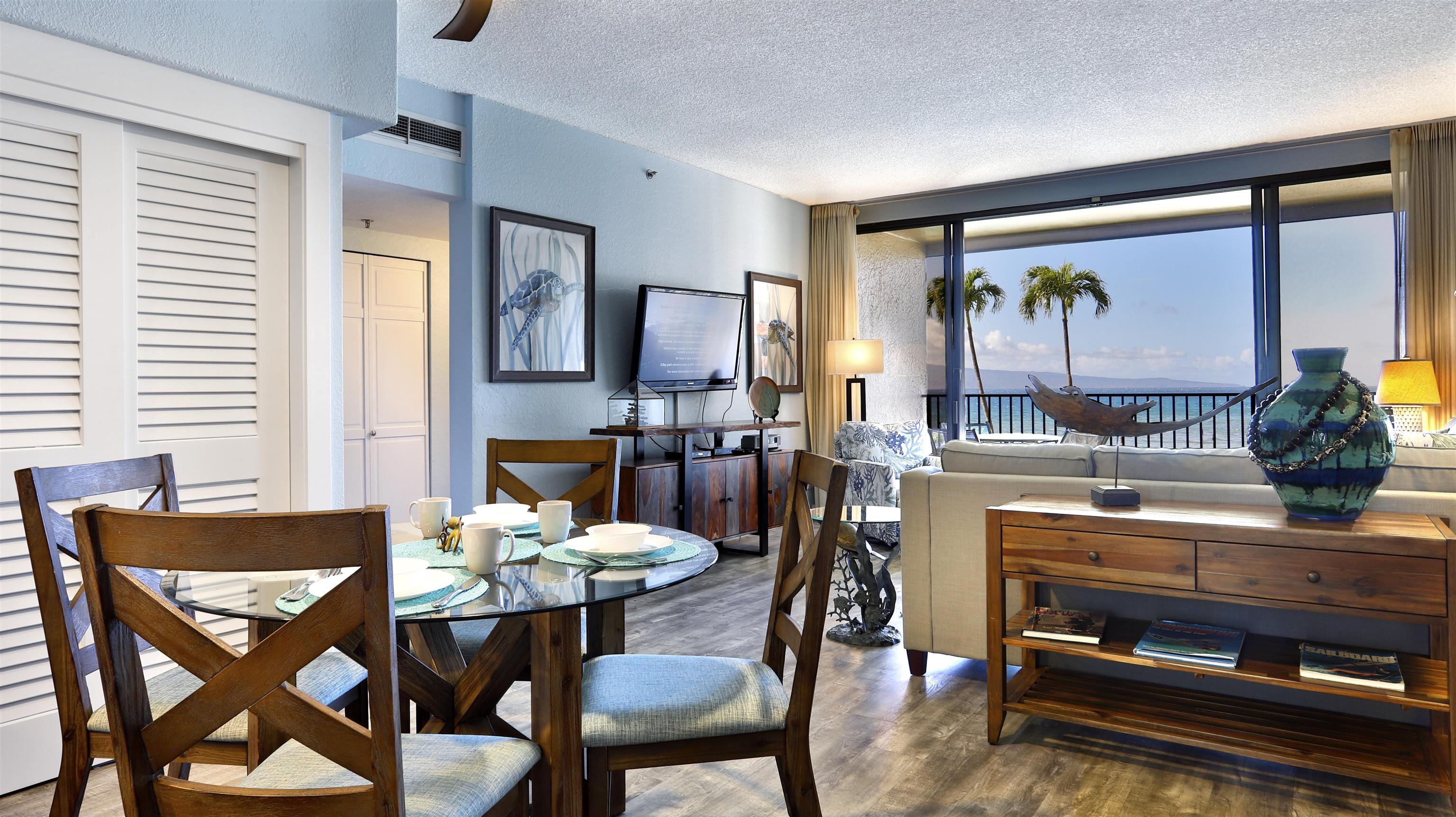 a dining room with furniture and window