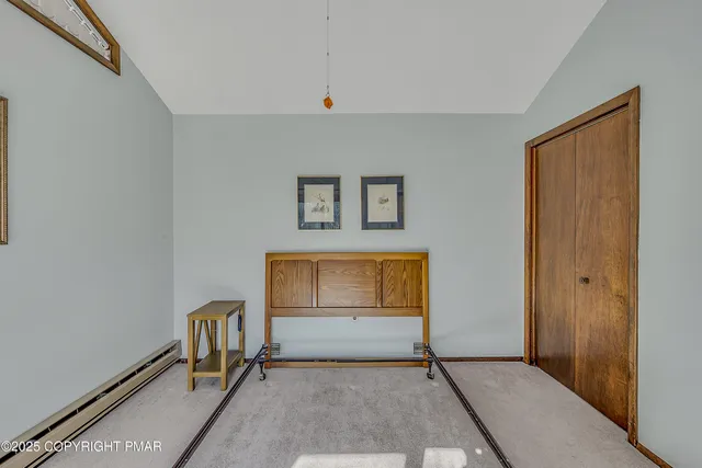 a bathroom with a sink and a window