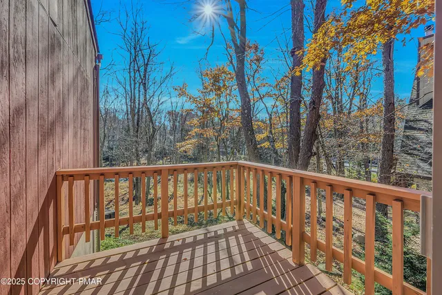 a bathroom with a sink a mirror and a shower