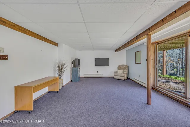 a view of a swimming pool with an outdoor seating